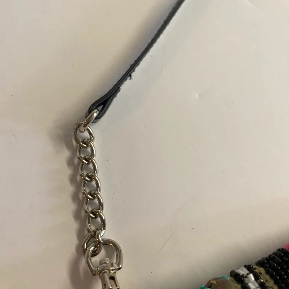 Twig & Arrow Gorgeous beaded shoulder bag.In excellent condition.Chain straight